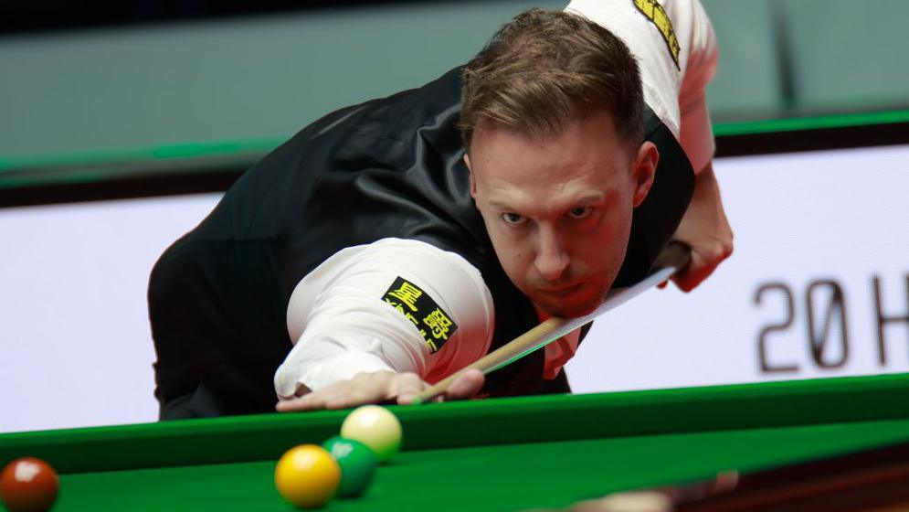 Judd Trump takes a shot at the Players Championship