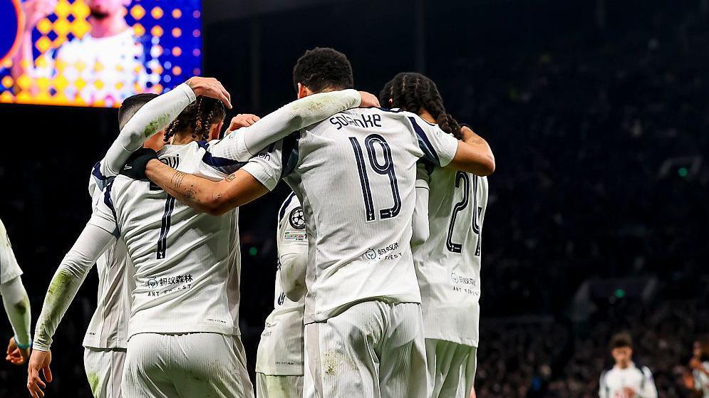 Tottenham players celebrate against Dortmund