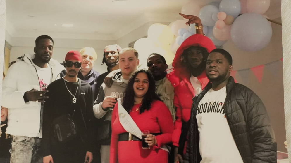 Shawn, second from left, at a halloween party in Birmingham. He is surrounded by friends enjoying themselves