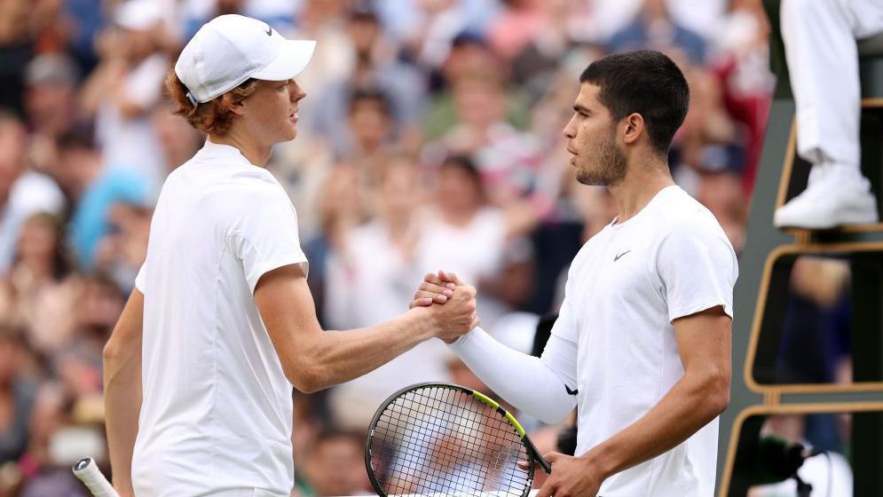 Jannik Sinner and Carlos Alcaraz shake hands