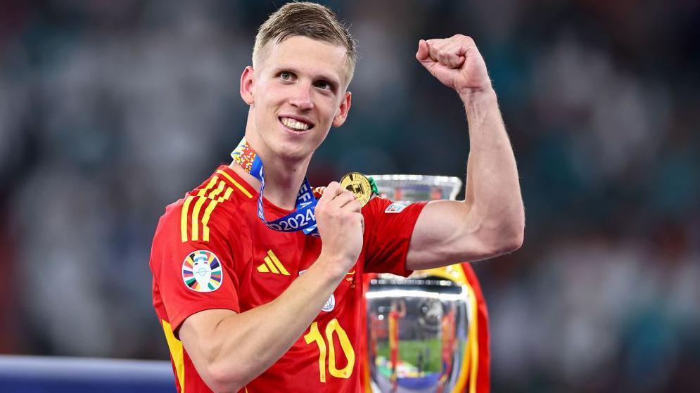 Dani Olmo celebrates after helping Spain with Euro 2024