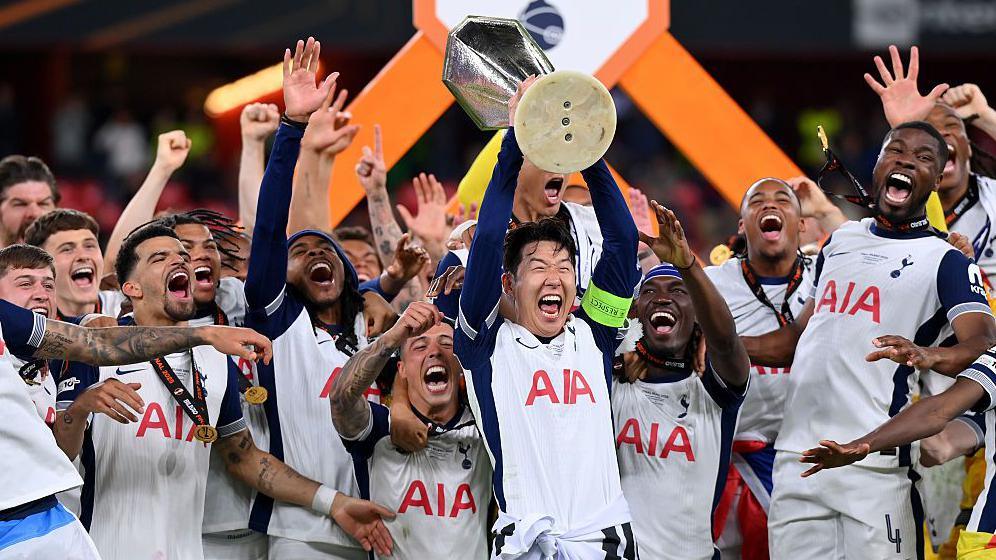 Son Heung-Min of Tottenham Hotspur lifts the Europa League trophy after his team's victory in the UEFA Europa League Final 2025 between Tottenham Hotspur and Manchester United