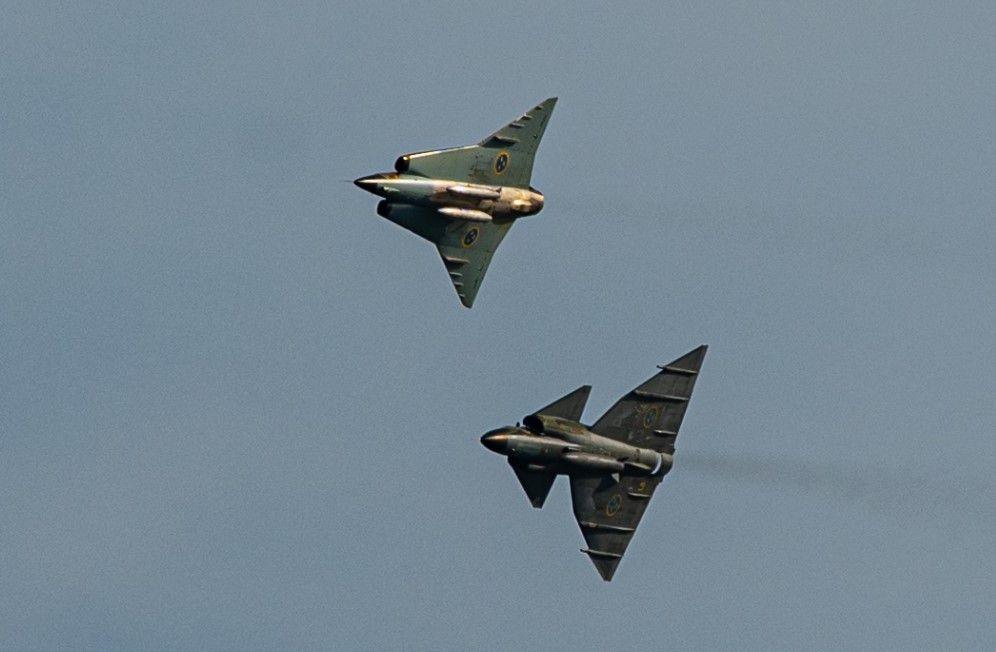 Two Swedish delta-wing fighter jets - the Saab Viggen and Saab Draken