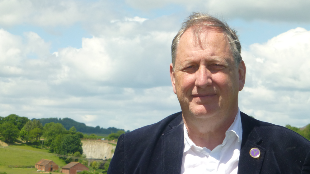 Steve Ashton Independent candidate for Yeovil looking at the camera standing in a field