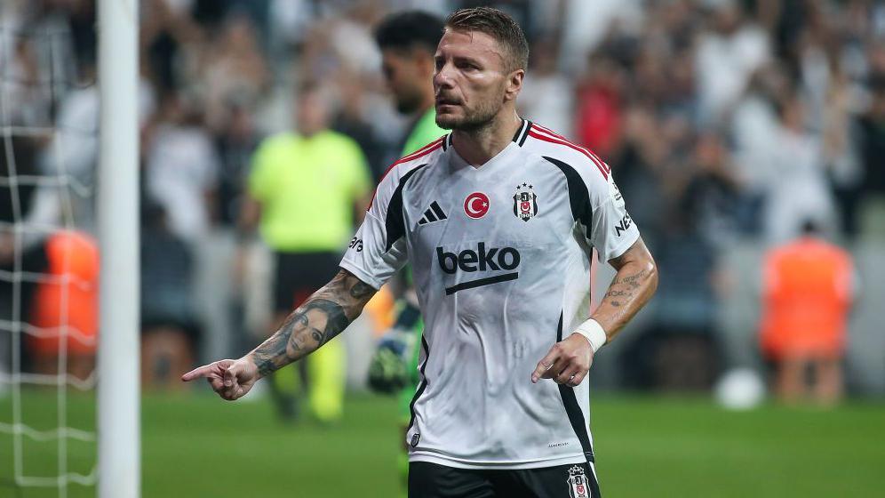 Ciro Immobile of Besiktas celebrates after scoring his team's first goal during the Turkish Super League match between Besiktas and Sivasspor