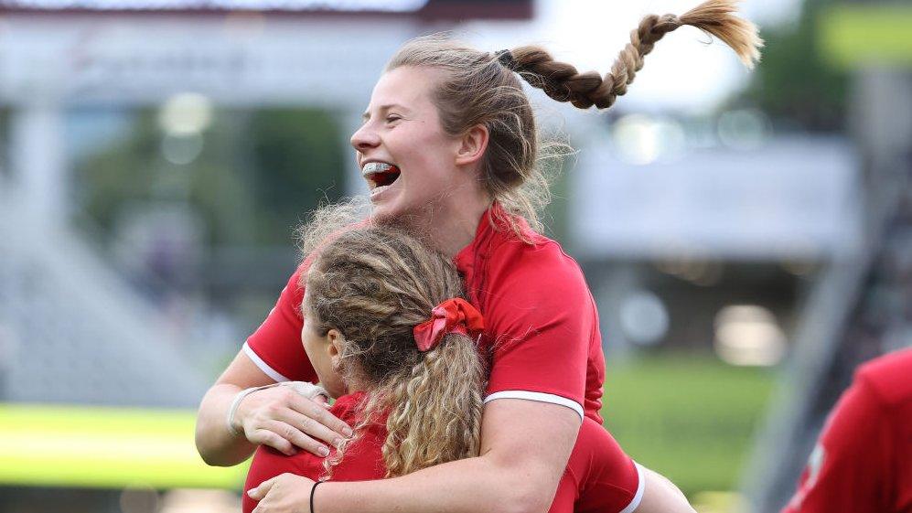 Abby Dow celebrating after a try
