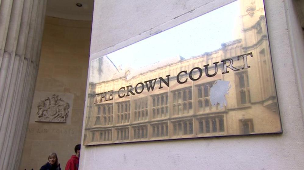 The plaque outside Bristol Crown Court