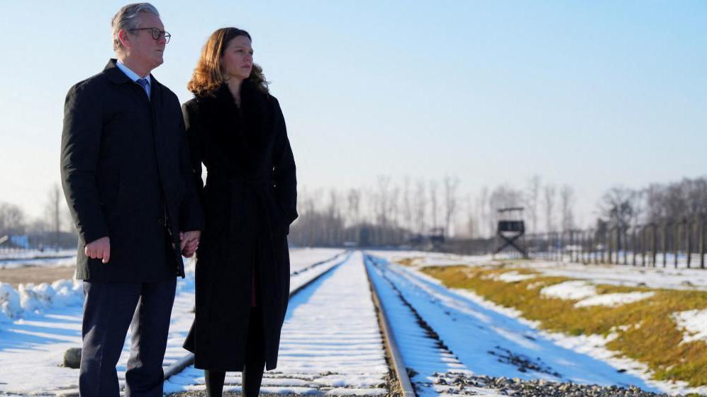 Prime Minister Sir Keir Starmer and his wife Lady Victoria, visit the Memorial and Museum Auschwitz-Birkenau, a former German Nazi concentration and extermination camp, in Oswiecim, during his visit to Poland to begin talks on a new defence and security agreement. Picture date: Friday January 17, 2025. 