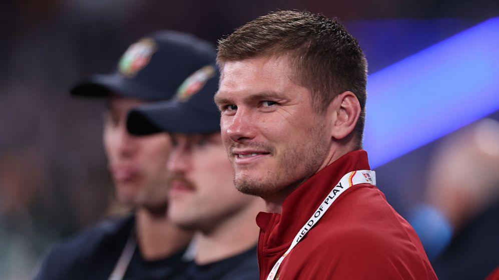 Owen Farrell smiles for the cameras