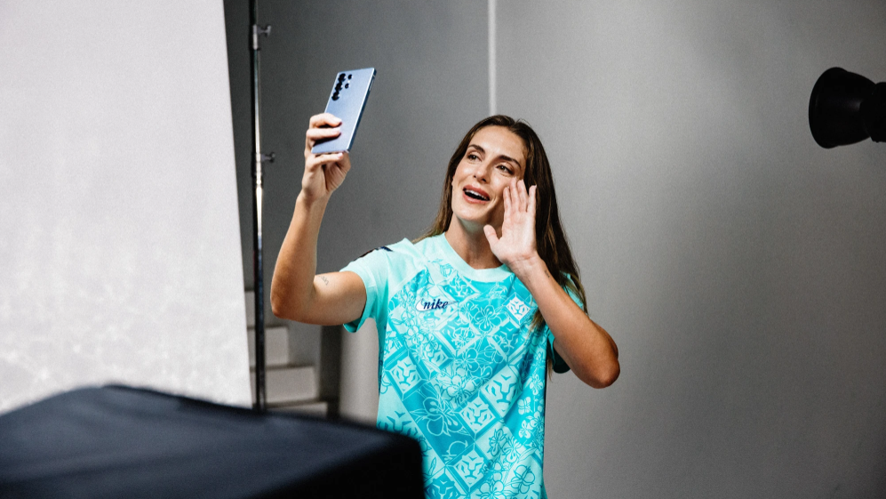 Alexia Putellas taking a selfie in a London City Lionesses shirt.