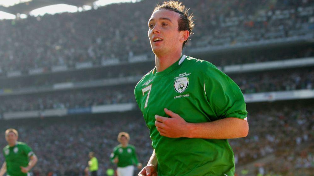 Stephen Ireland celebrates after scoring the opening goal during the Euro 2008 Group D Qualifier between the Republic of Ireland and Wales