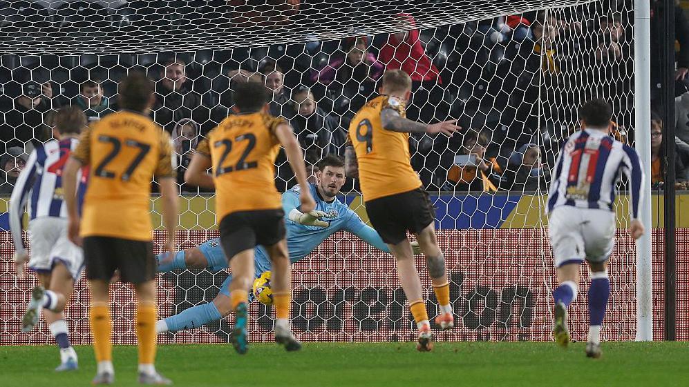 Hull City striker Oli McBurnie scores from the penalty spot against West Bromwich Albion.