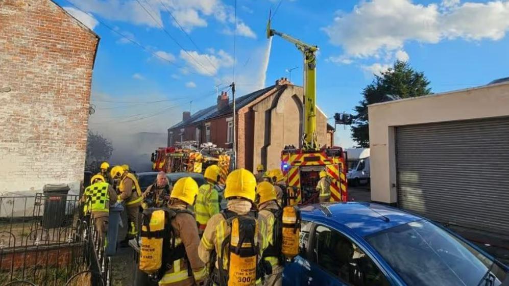 Firefighters working to tackle the blaze at Catherine Street in Crewe