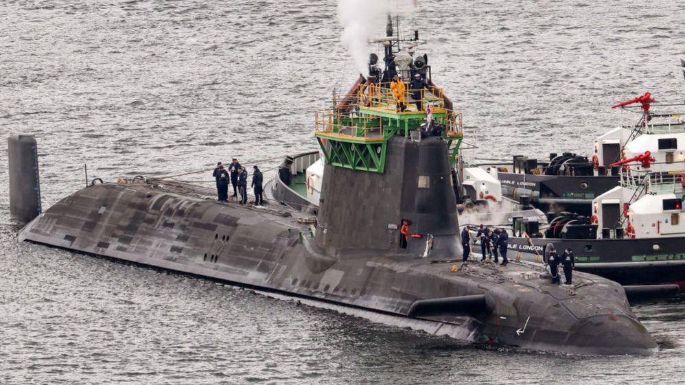 HMS Artful an Astute-class nuclear-powered fleet submarine is manoeuvred at His Majesty's Naval Base Clyde on March 04, 2025 in Faslane, Scotland.