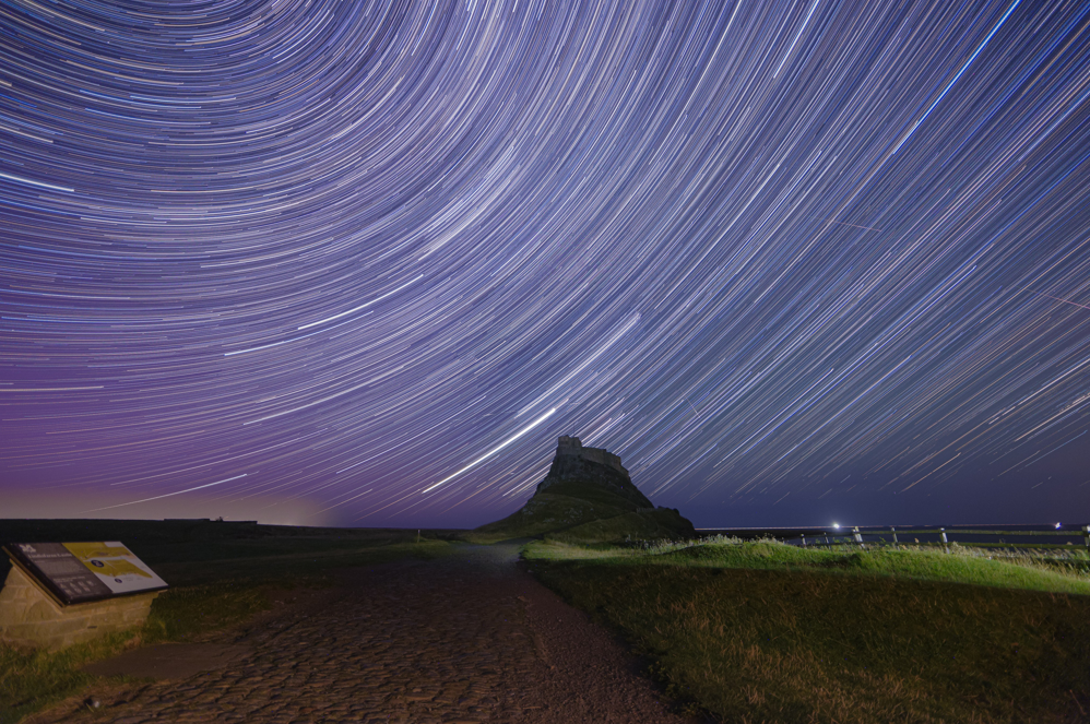 Rings of light can be seen in the night sky