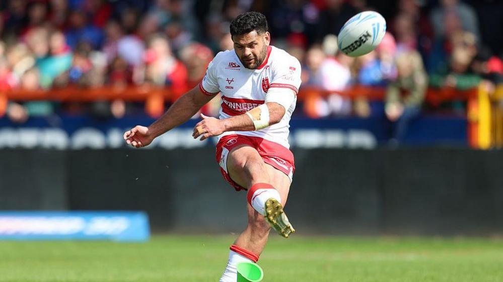 Rhyse Martin kicks a goal off the tee for Hull KR against Wigan