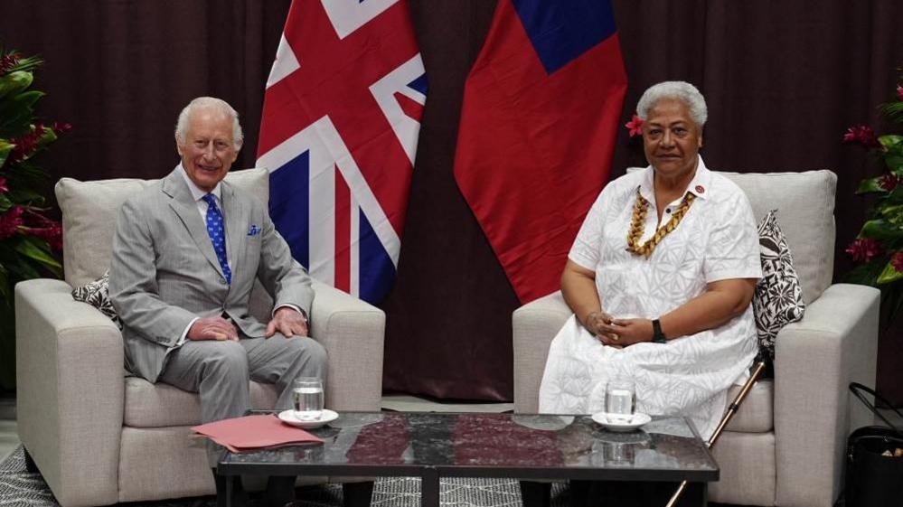 Britain's King Charles with Samoa's Prime Minister Fiame Naomi Mata'afa at Faleolo International Airport