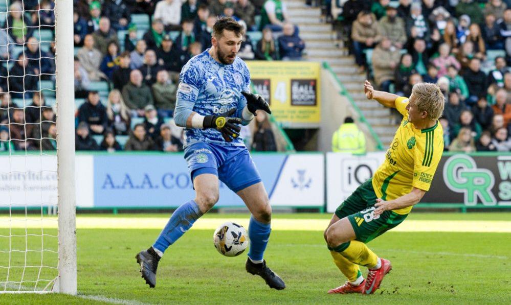 Celtic's Daizen Maeda (right) scores against Hibs