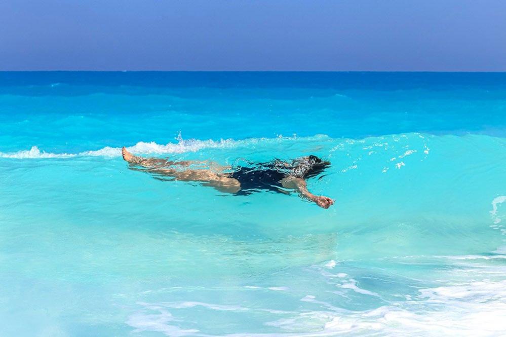 Woman swimming in the sea