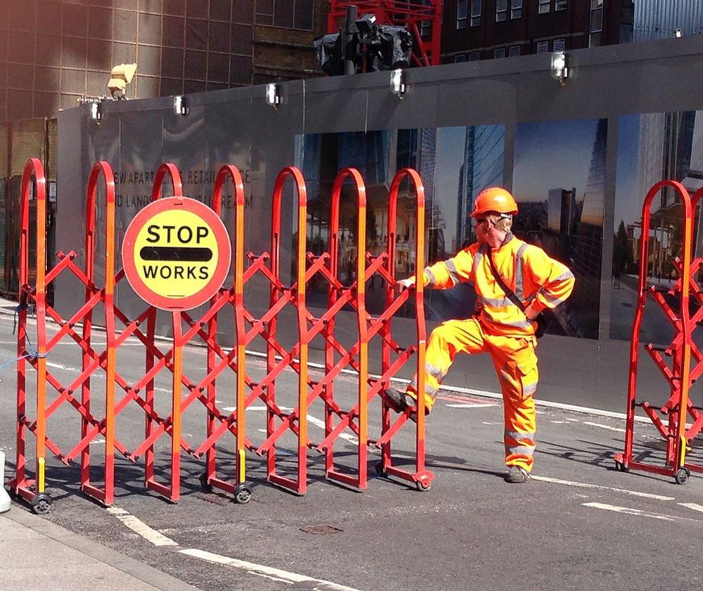 Workmen and a barrier