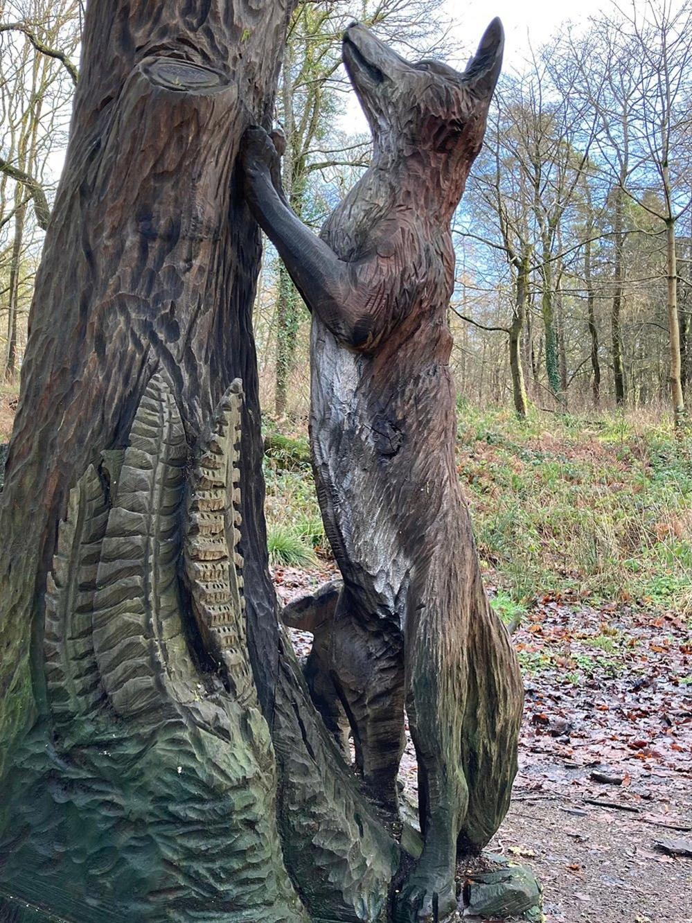 Carved fox in a wood