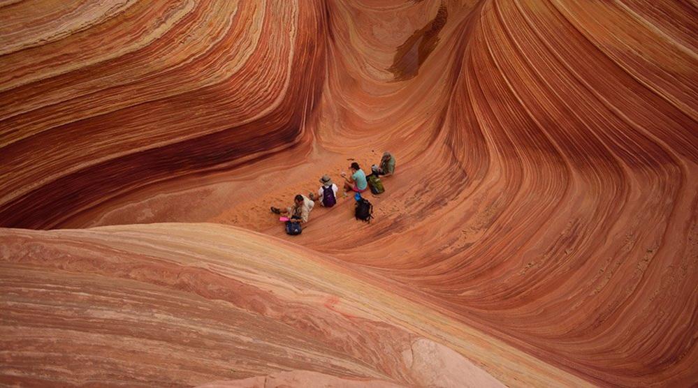 People stop for a break in a canyon