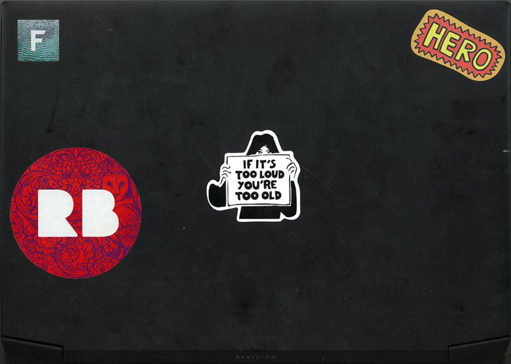 Laptop with sticker that reads 'if it's too loud, you're too old.'