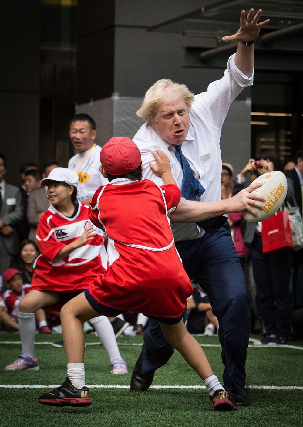 Mayor of London Boris Johnson joins a Street Rugby tournament in Tokyo