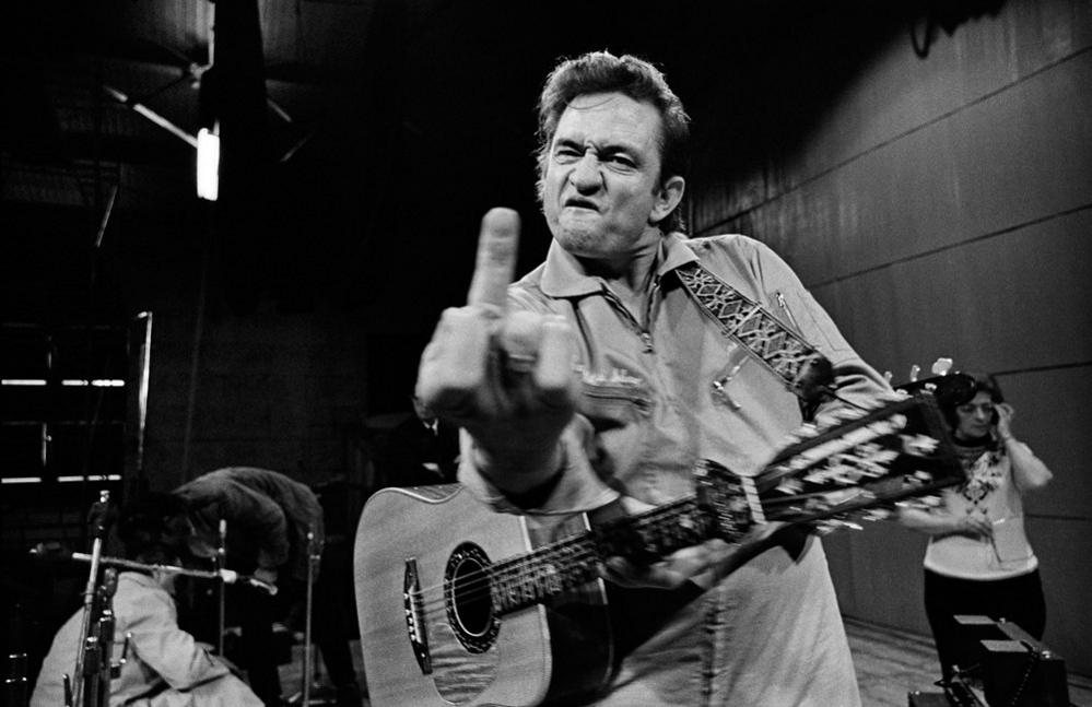 Johnny Cash flipping the bird at San Quentin Prison, 1969