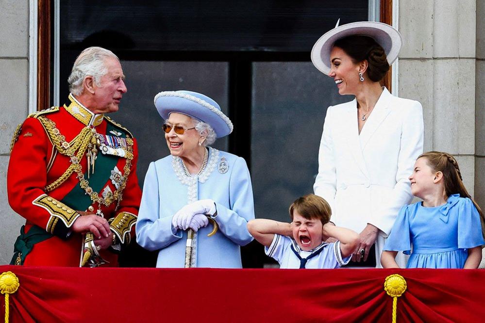 Britain's Queen Elizabeth, Prince Charles and Catherine, Duchess of Cambridge, along with Princess Charlotte and Prince Louis appear on the balcony of Buckingham Palace as part of Trooping the Colour parade during the Queen's Platinum Jubilee celebrations in London, Britain, 2 June 2022