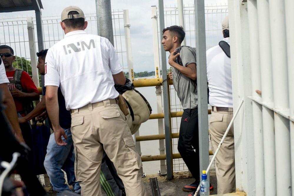 A migrant enters Mexico at the border with Guatemala.