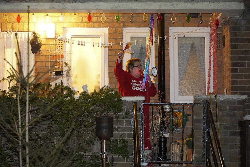 Residents in Manchester cheer for the NHS