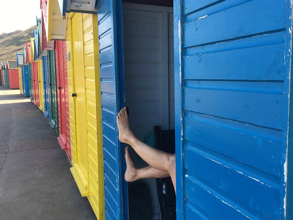 Legs in a beach hut