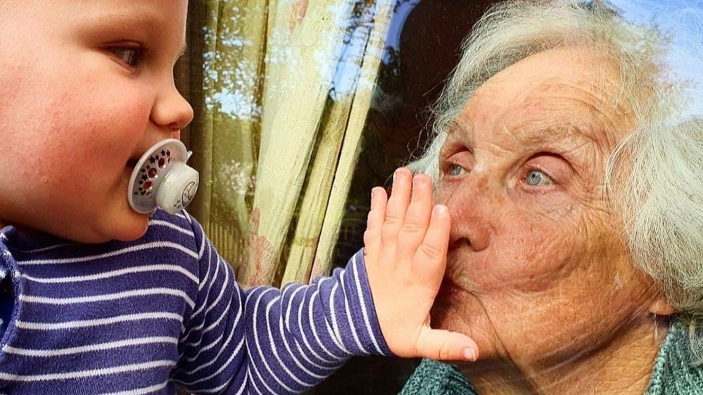 Young child and his great grandma