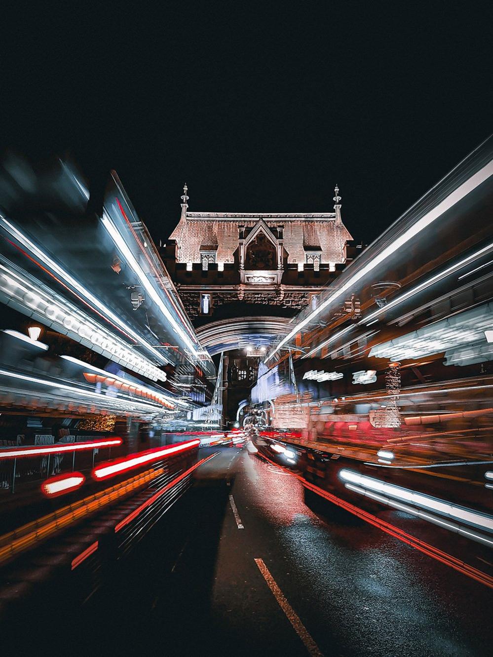 Light trails of cars passing over London's Tower Bridge