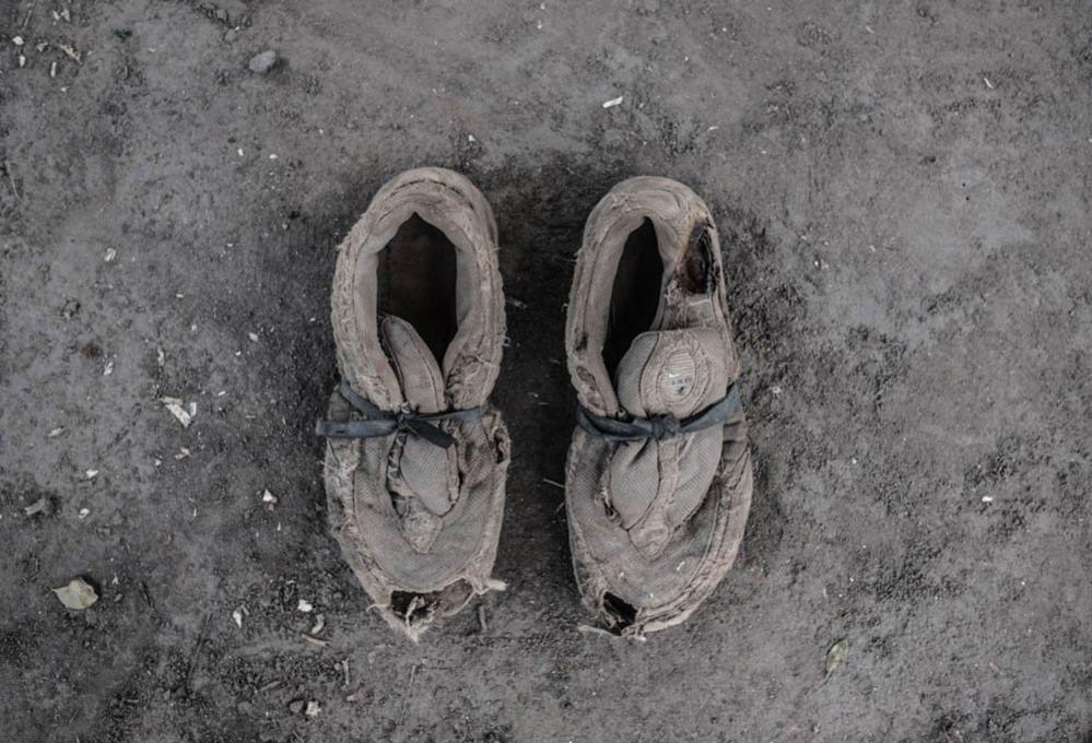 A pair of shoes belonging to Okongo Charles