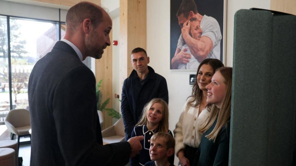 Prince William, Kevin Sinfield, Lindsey Burrow and family at the centre