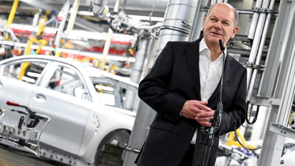 German Chancellor Olaf Scholz speaks during a visit at the BMW Group plant in Munich, Germany, December 5, 2023