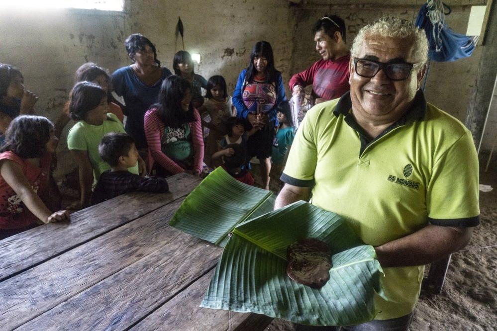 Cesar de Mendes shows off the chocolate he made during the workshop