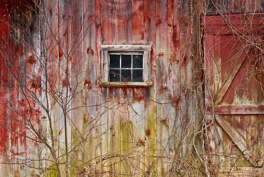 Faded paint on a wooden wall