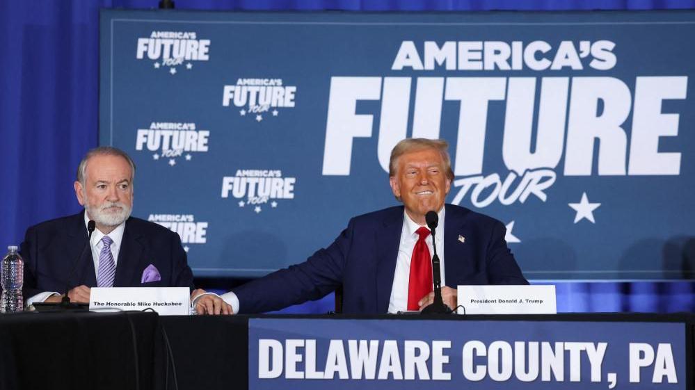 Mike Huckabee and Donald Trump are seen at a campaign event in Drexel Hill, Pennsylvania, U.S., October 29, 2024