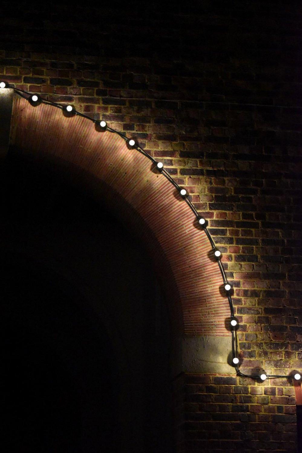 Lights around a curved tunnel