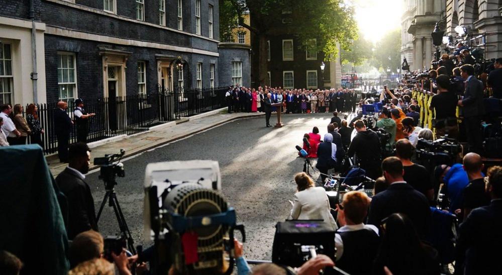 The media gather for Johnson's final speech