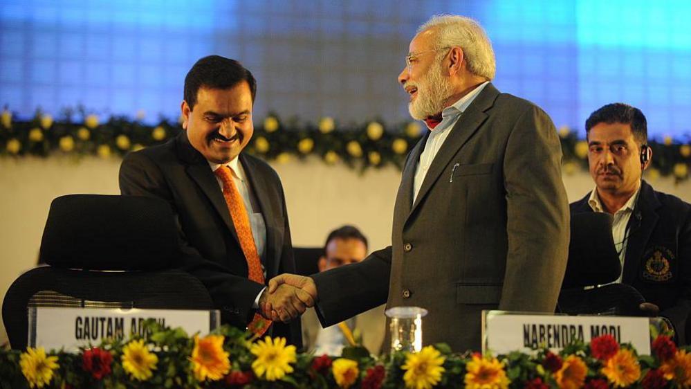 Gujarat Chief Minister Narendra Modi and Chairman Of Adani Group Gautam Adani at 5th Vibrant Gujarat Global Summit on January 13, 2011 in Gandhinagar, Indi