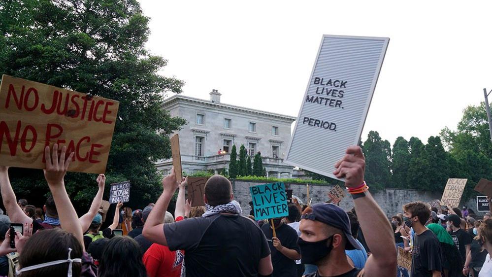 Black Lives Matter protesters gathered outside the couple's home following the incident