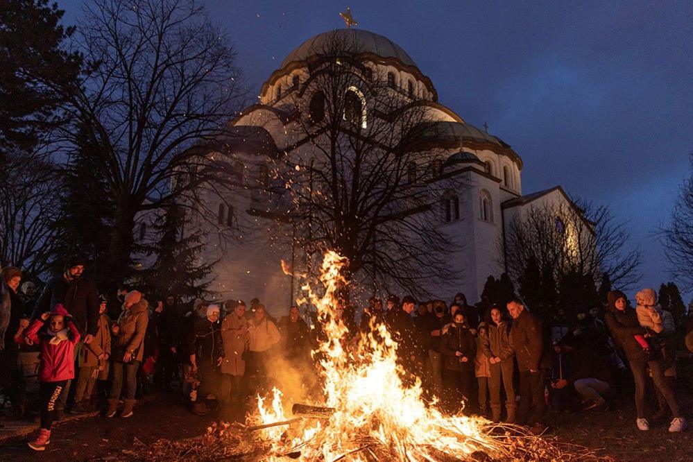 Believers burn dried oak branches