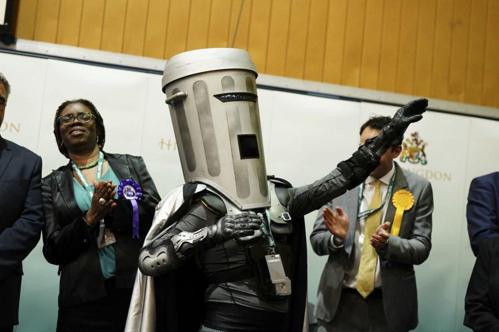 Count Binface celebrates on stage as the results are read in the Uxbridge and South Ruislip by-election