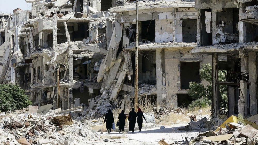 Destroyed buildings in government-held Jouret al-Shiah neighbourhood of central Syrian city of Homs on September 19, 2016