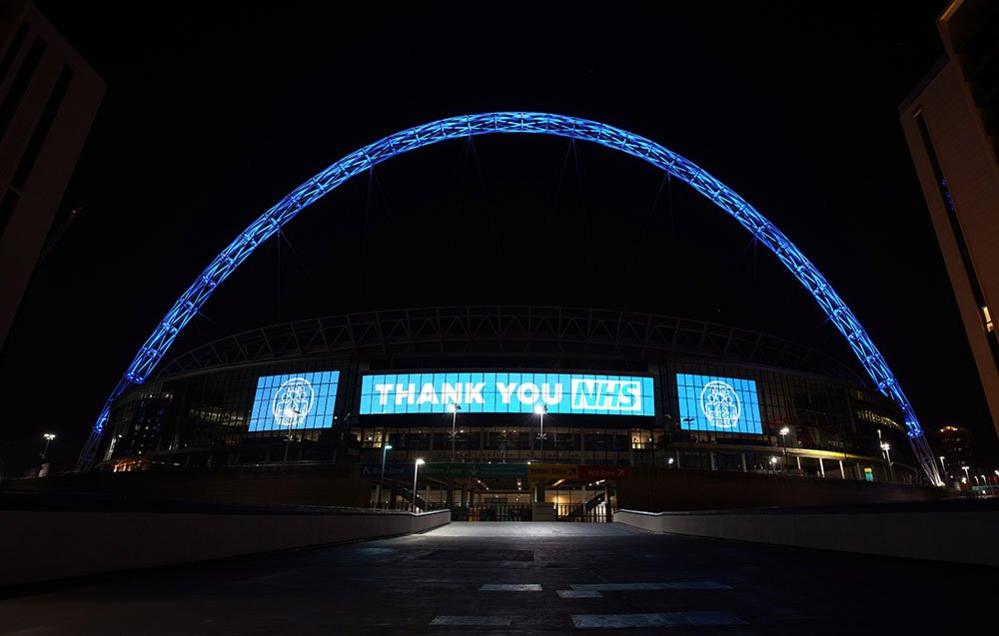 Wembley Arch lit up in blue