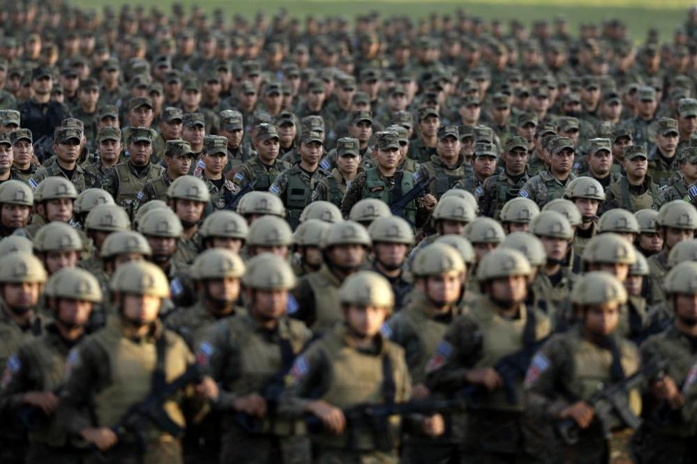 Members of the military stand in formation as the government of El Salvador presented 14,000 military personnel as part of the Territorial Control Plan for public security, in Ciudad Arce, El Salvador, 23 November 2022.